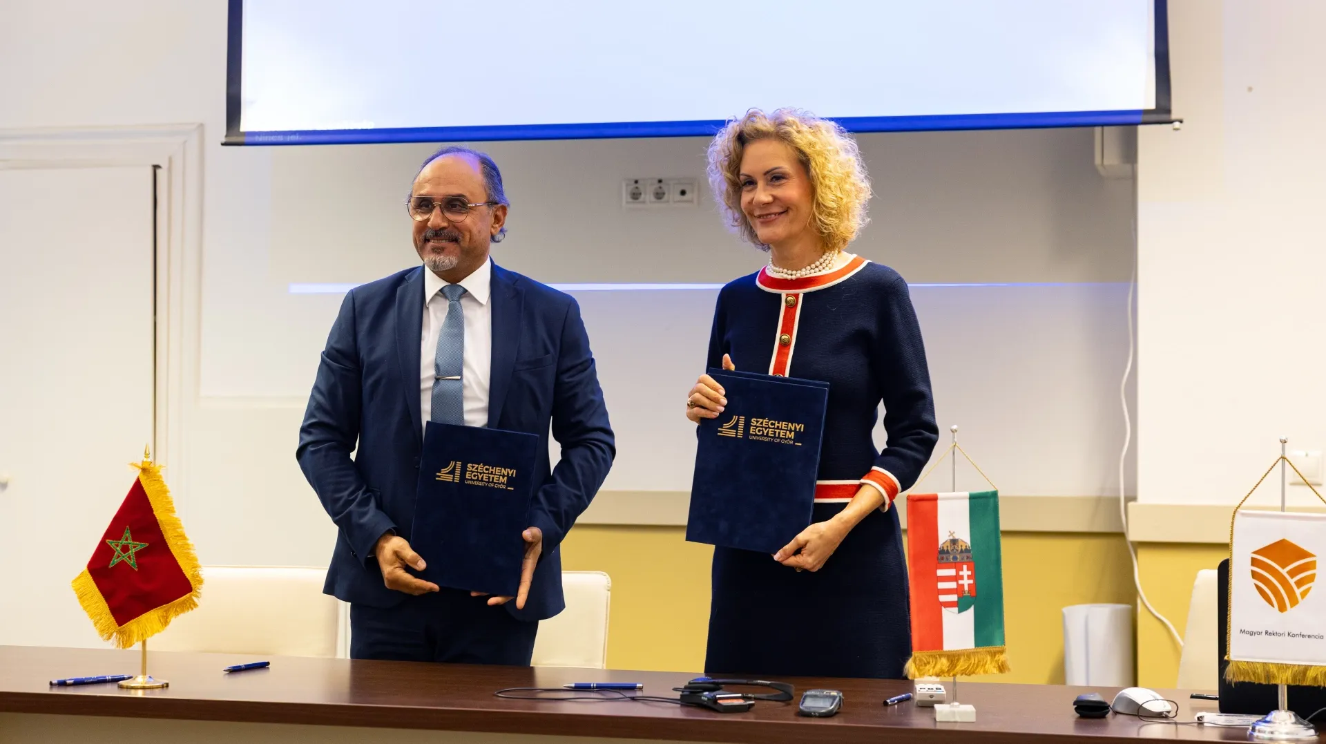 Dr Mehdi Khalid, Acting President of Sultan Moulay Slimane University, and Dr Eszter Lukács, Vice President for International Affairs and Strategic Relations at Széchenyi István University, signing the cooperation agreement